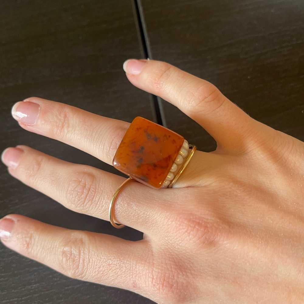 Orange speckled ring